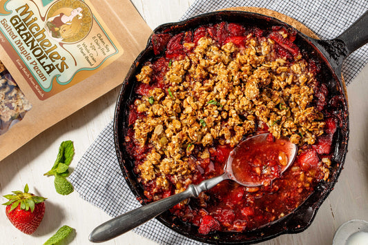 Michele's Salted Maple Pecan Granola as the topping for a Strawberry Crisp